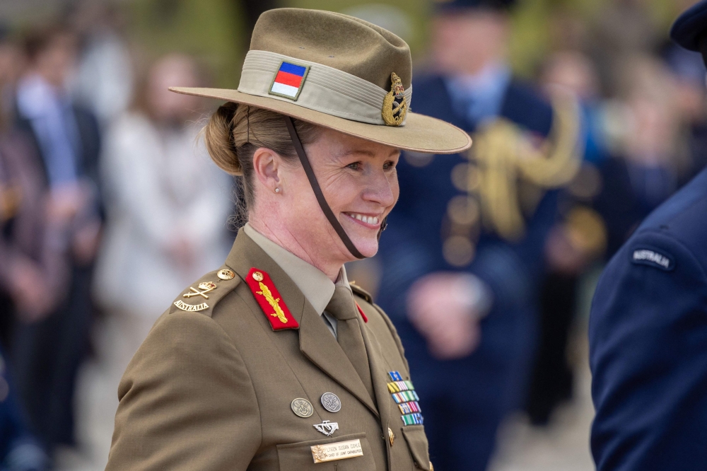 This handout photo from the Australian Defence Force taken on July 4, 2024, shows Lieutenant general Susan Coyle reacting as she attends an official event in Canberra. (Photo by Handout / Australian Defence Force / AFP) 