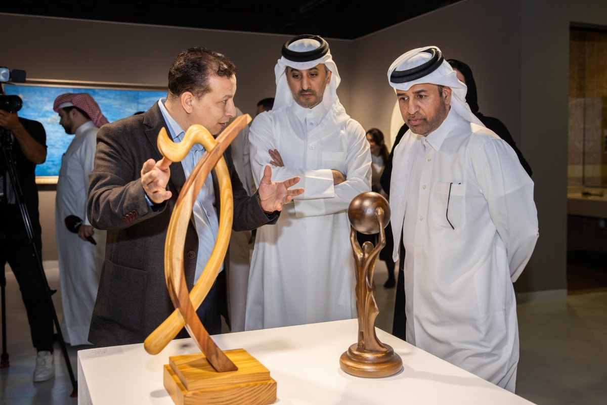 Director General of Cultural Village (Katara) Professor Dr. Khalid bin Ibrahim Al-Sulaiti with officials during the inauguration of the exhibition.