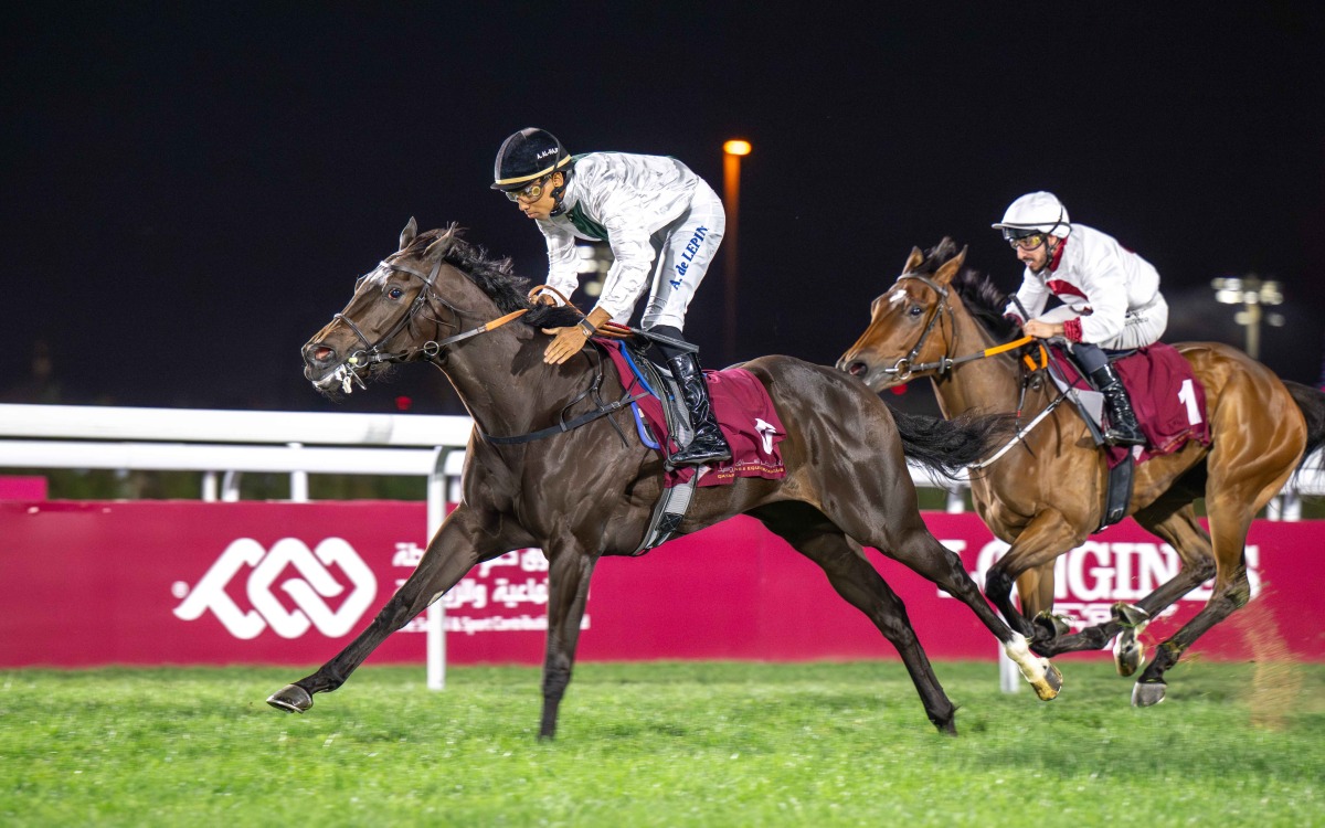 Samha Alseej, ridden by Arnaud de Lepine, leads the field during the feature. PIC: Juhaim/QREC