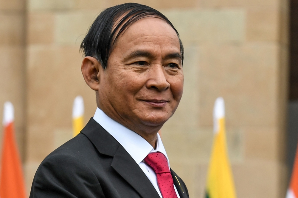 (Files) Myanmar's President Win Myint looks on during an official visit in New Delhi on February 27, 2020. (Photo by Prakash Singh / AFP)