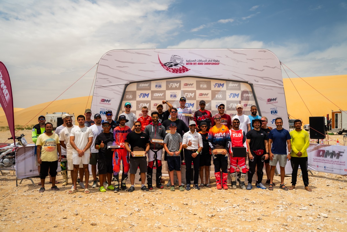 QMMF Executive Director Amro Al-Hamad poses for a photo with the participants.