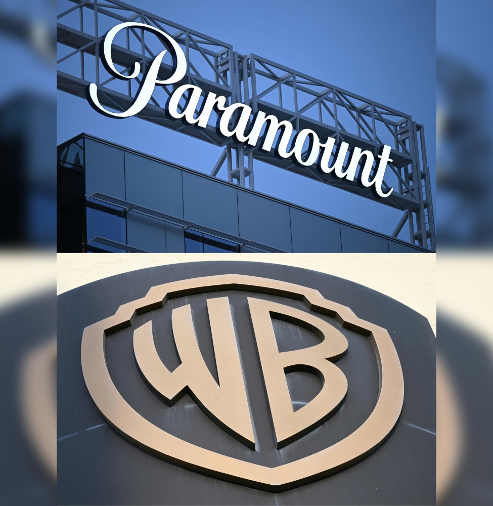 (COMBO) This combination of files pictures created on December 22, 2025 shows the Paramount logo (TOP) displayed at Columbia Square along Sunset Blvd in Hollywood, California on March 9, 2023 and the WB logo on the exterior of Warner Bros. Studios, Burbank in Burbank, California on October 21, 2025. Photo by Patrick T. Fallon and Robyn Beck / AFP