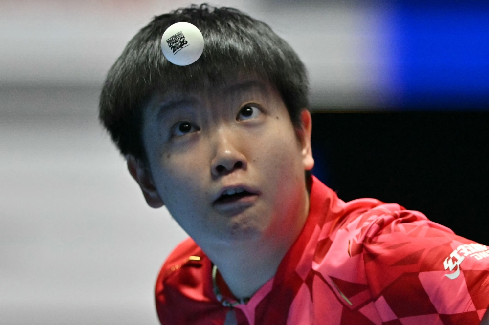 Festivities for table tennis world champion Sun Yingsha's 25th birthday included messages on massive digital billboards, a drone show and packed fan gatherings at shopping malls across the country. (Photo by Glyn Kirk / AFP)
