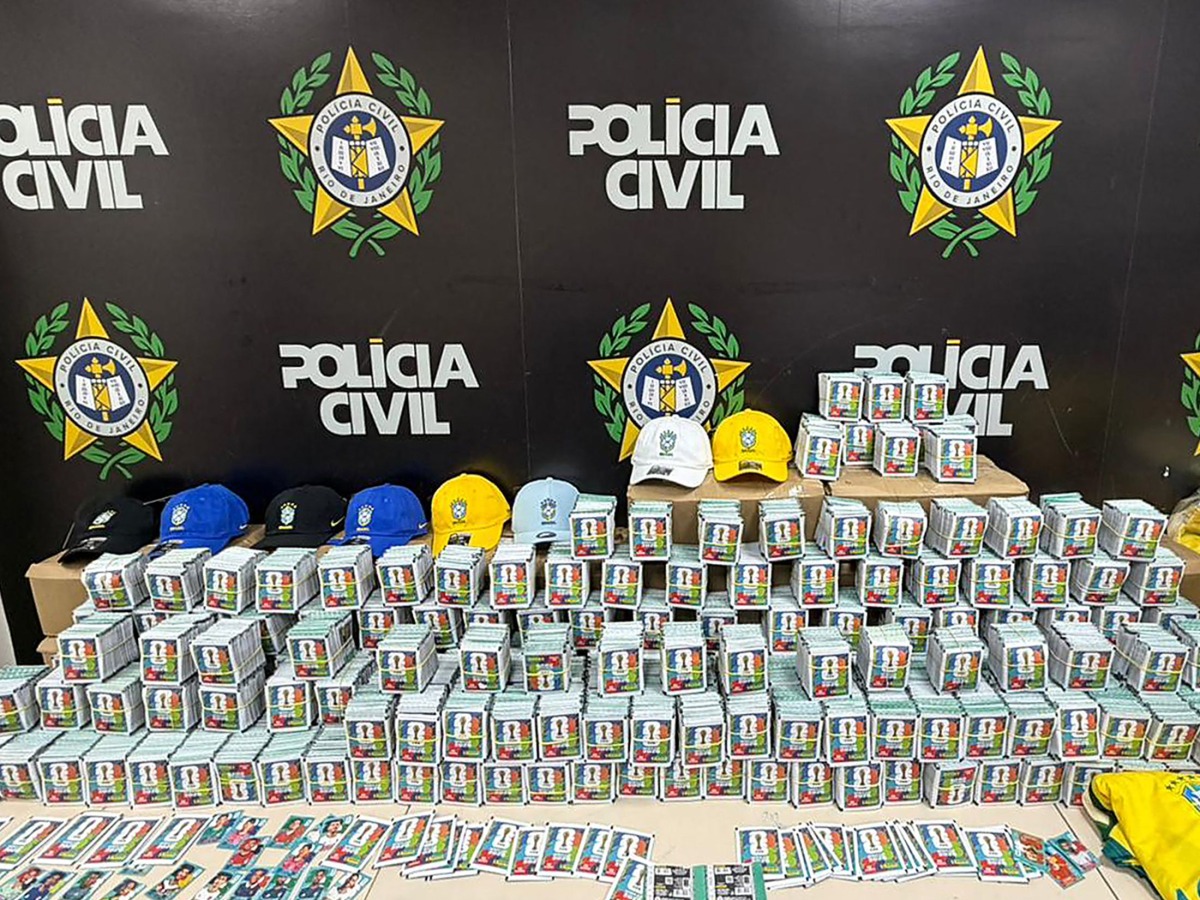 Handout picture released by Rio de Janeiro's Civil Police shows seized counterfeit Panini World Cup album stickers at the Civil Police headquarters, in Rio de Janeiro, Brazil on May 22, 2026. (Photo by Handout / RIO DE JANEIRO CIVIL POLICE / AFP)
