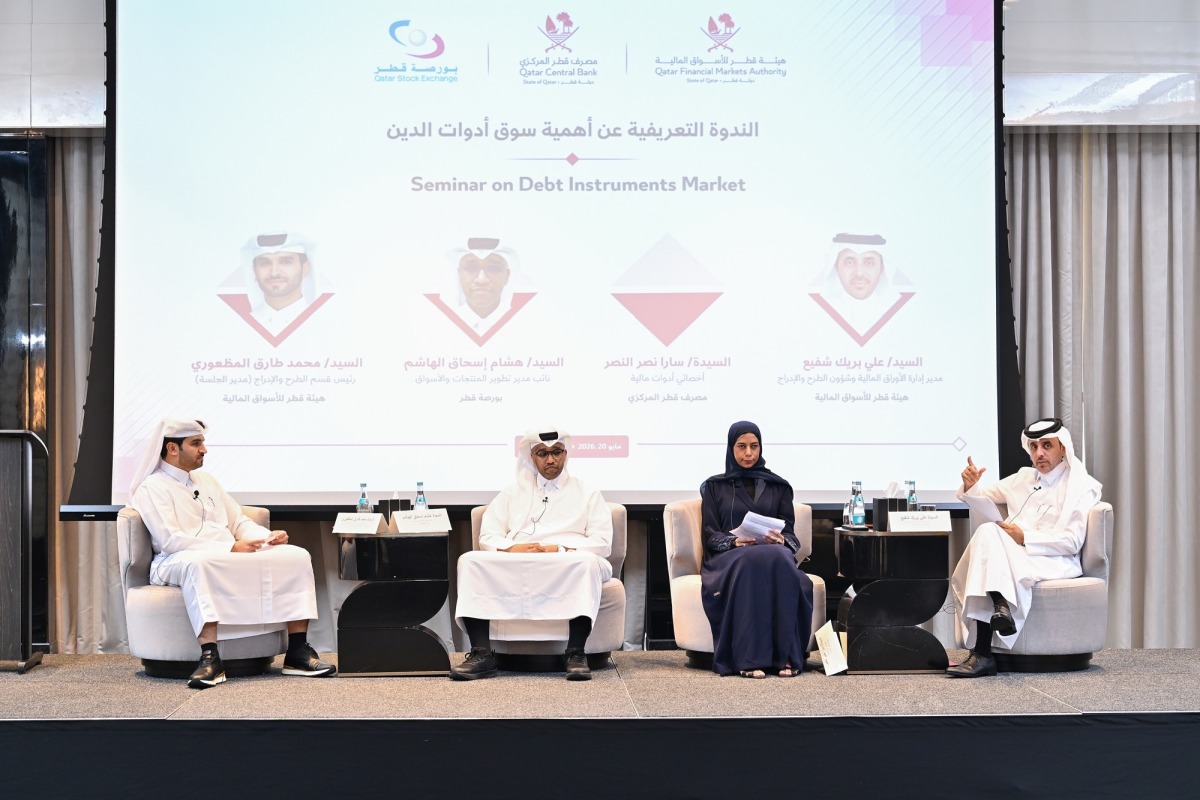 Panelists exchanging ideas during the seminar on the debt instruments market in Qatar. 