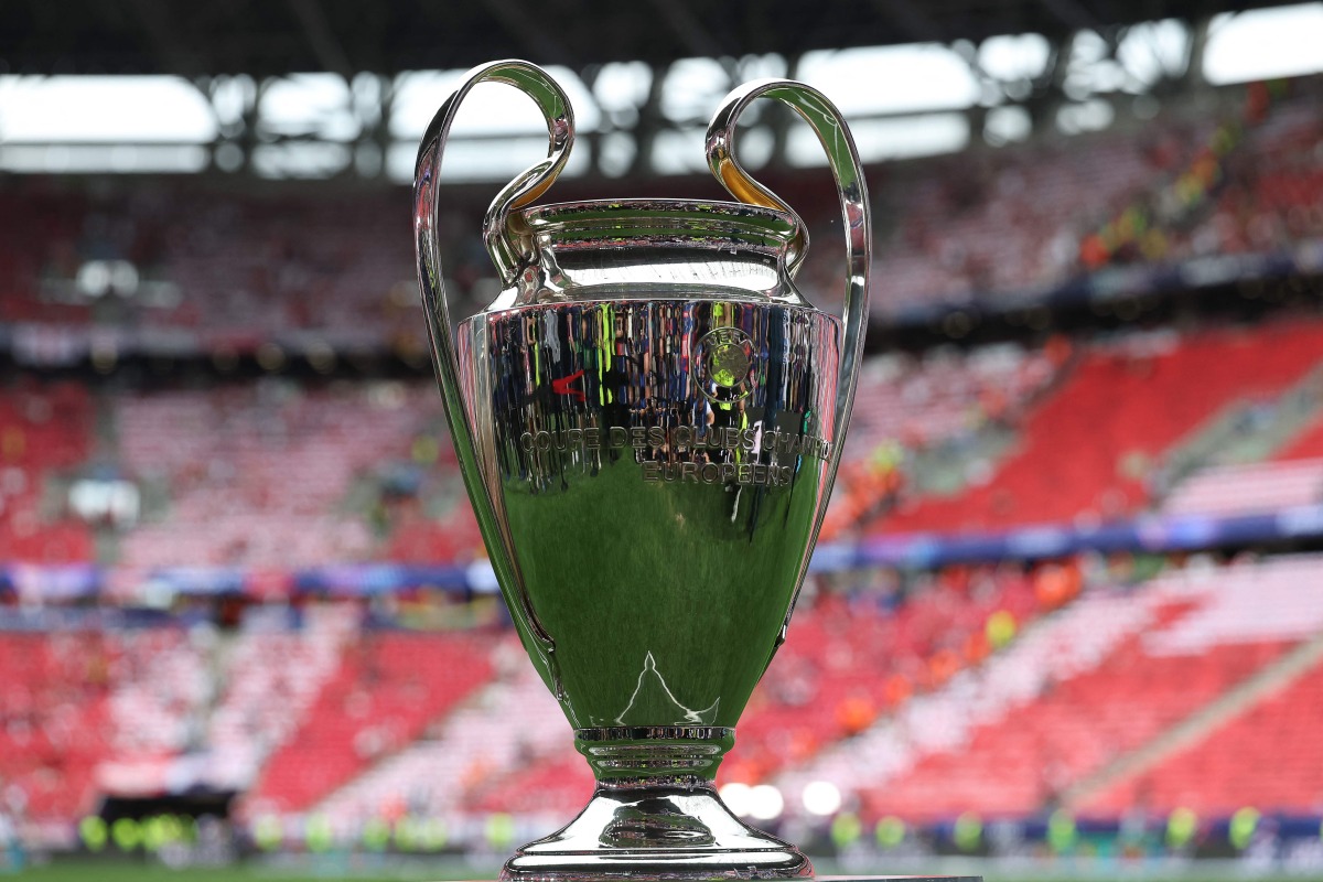 The trophy is displayed on the pitch prior to the UEFA Champions League final football match between Paris Saint-Germain (PSG) and Arsenal FC at the Puskas Arena in Budapest on May 30, 2026. (Photo by FRANCK FIFE / AFP)