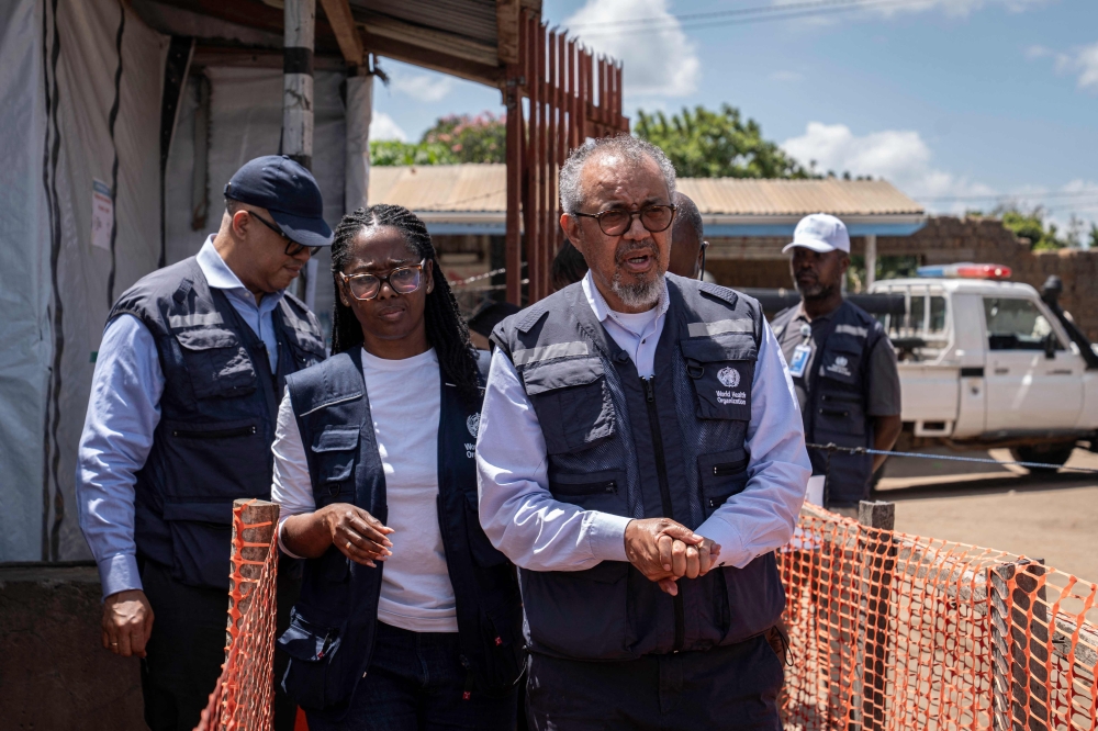 World Health Organization (WHO) Director-General Tedros Adhanom Ghebreyesus visits the Ebola treatment center to witness the discharge of recovered patients in Bunia, in the northeastern Democratic Republic of the Congo