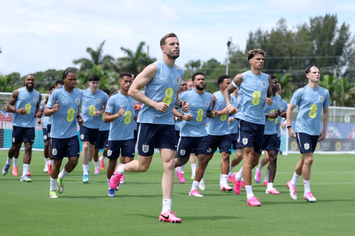 England's Jordan Henderson warms up with teammates during a training session in Palm Beach Gardens, Florida, yesterday.