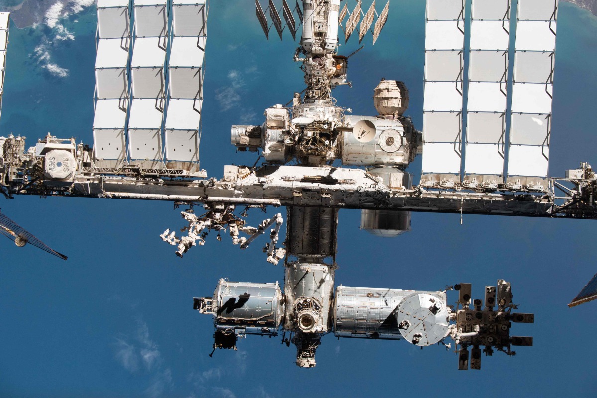 This handout image released by NASA on September 19, 2024 shows the International Space Station's US segment and portions of the Russian segment are pictured from the SpaceX Crew Dragon Endeavour during a fly around of the orbiting lab that took place following its undocking from the Harmony module痴 space-facing port on Nov. 8, 2021. Photo by Handout / NASA / AFP
