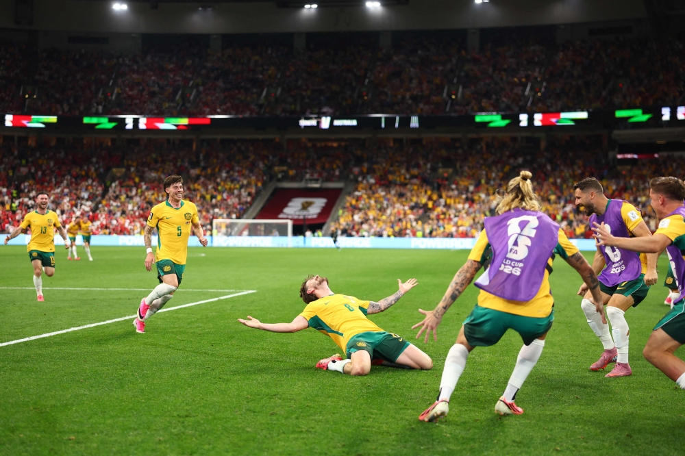 Connor Metcalfe #8 of Australia celebrates scoring his team's second goal during the FIFA World Cup 2026 Group D match between Australia and Türkiye at BC Place Vancouver on June 13, 2026 in Vancouver, British Columbia. (Photo by Dean Mouhtaropoulos /AFP)