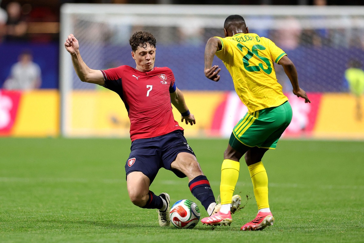 Ladislav Krejci #7 of Czechia competes for the ball against Kamogelo Sebelebele #25 of South Africa during the FIFA World Cup 2026 Group A match between Czechia and South Africa at Atlanta Stadium on June 18, 2026 in Atlanta, Georgia. (Photo by Alex Slitz / GETTY IMAGES NORTH AMERICA / Getty Images via AFP)
