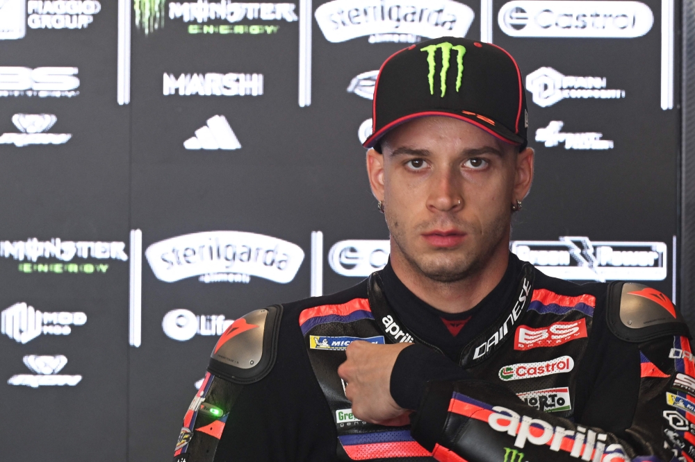 Team Aprilia Racing's Marco Bezzecchi is seen in the box during a free practice session prior to the MotoGP Grand Prix of Czechia in Brno, Czech Republic, on June 20, 2026. (Photo by Michal Cizek / AFP)