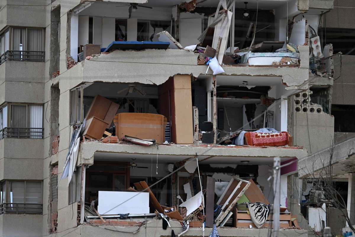 View of a destroyed building in La Guaira, Venezuela on July 4, 2026, following the June 24 twin earthquakes. (Photo by Raul ARBOLEDA / AFP)