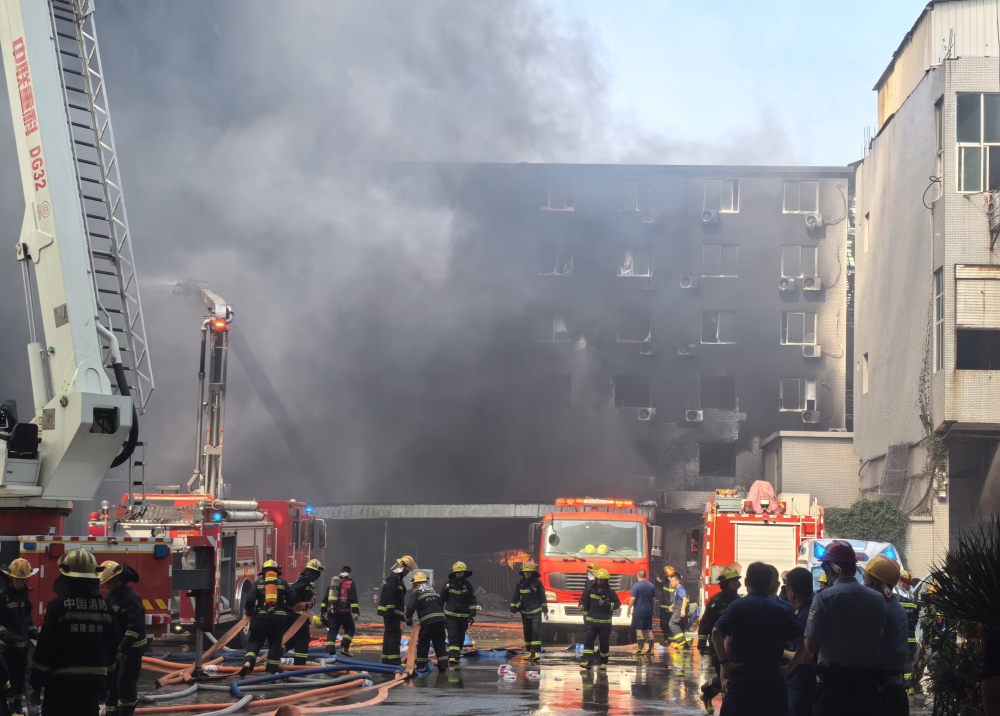 Firefighters work after a fire broke out at a footwear factory in Jiangtou Village, Chendai Township of Jinjiang City, southeast China's Fujian Province, on July 9, 2026.  (Xinhua/Zheng Liang)