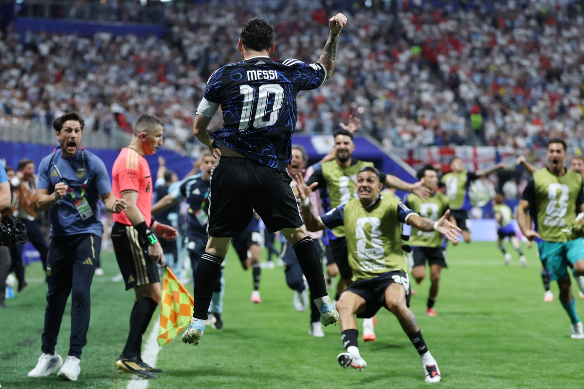 Argentina's forward #10 Lionel Messi celebrates his team's second goal scored by Argentina's forward #22 Lautaro Martinez (out of frame) during the 2026 World Cup football tournament semi-final match between England and Argentina at the Atlanta Stadium in Atlanta on July 15, 2026. (Photo by Thomas COEX / AFP)