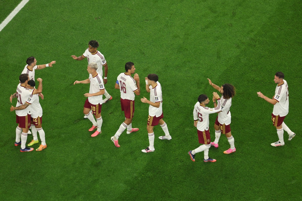 Spain’s players celebrate after Mikel Oyarzabal scored his team’s first goal during the semi-final against France on Tuesday. (AFP)
