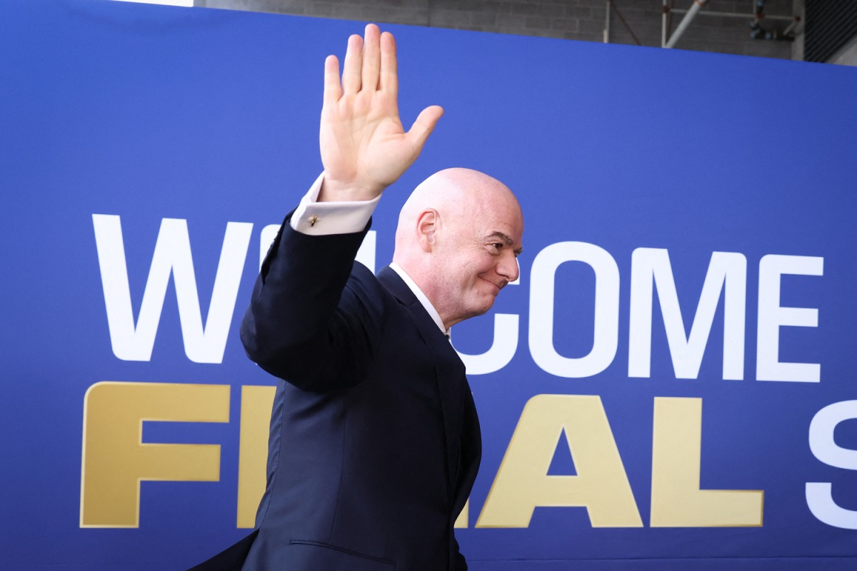 FIFA President Gianni Infantino waves as he arrives for the 2026 World Cup football tournament final match in East Rutherford on July 19, 2026. (Photo by Charly Triballeau / AFP)
