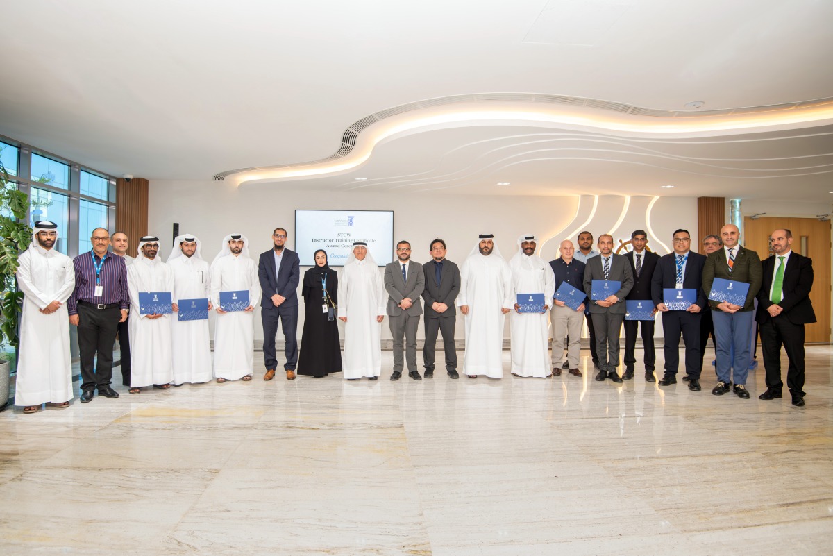 UDST President Dr. Salem Al-Naemi, officials and graduates during the ceremony.