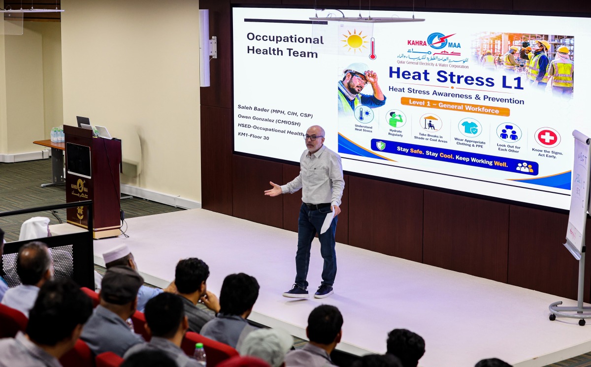 An official speaking during an awareness and training workshop.