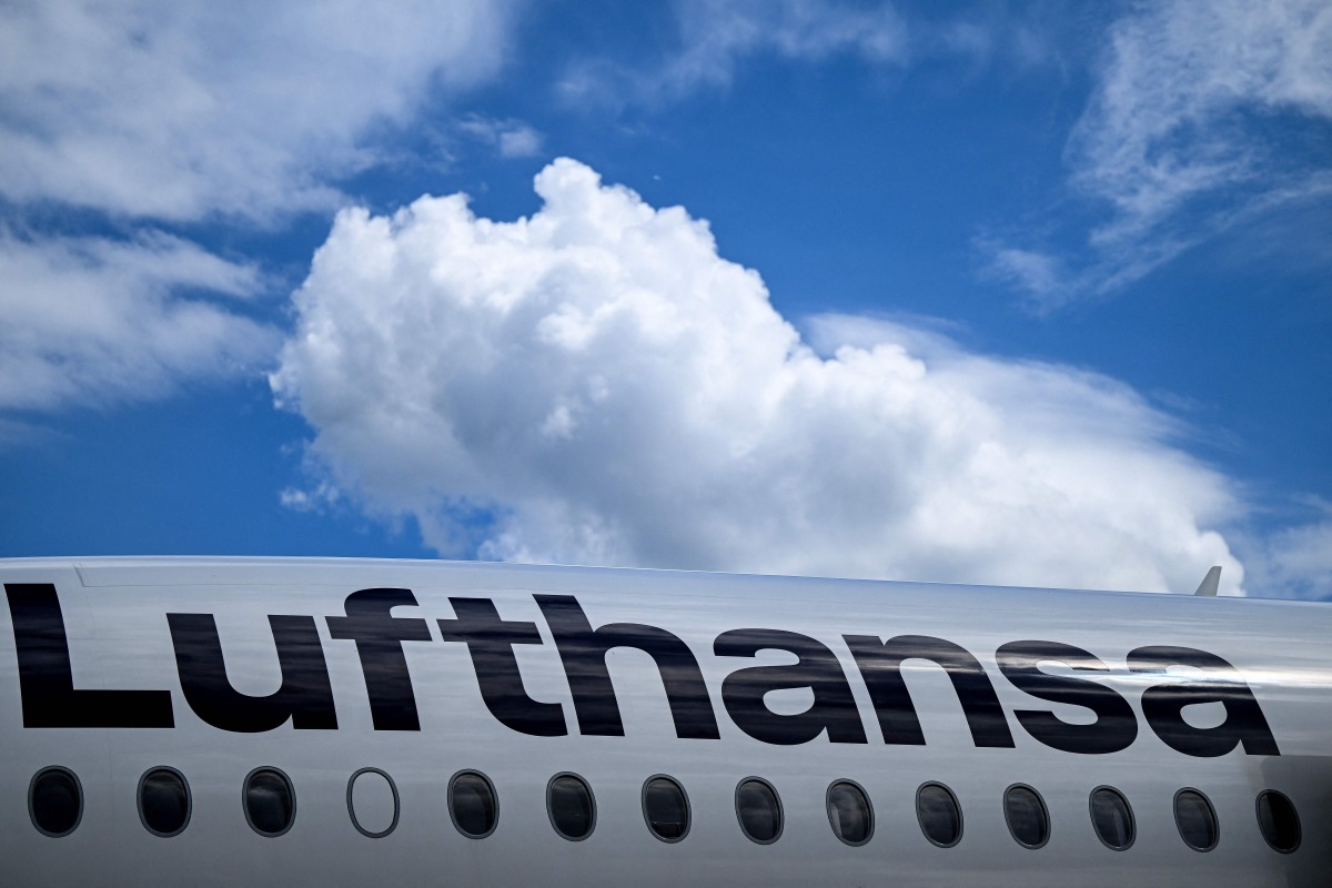 A German airlines Lufthansa sign is pictured on Lufthansa Airbus A350-900 at Frankfurt International Airport in Frankfurt am Main, western Germany, on June 2, 2026. Photo by Kirill KUDRYAVTSEV / AFP