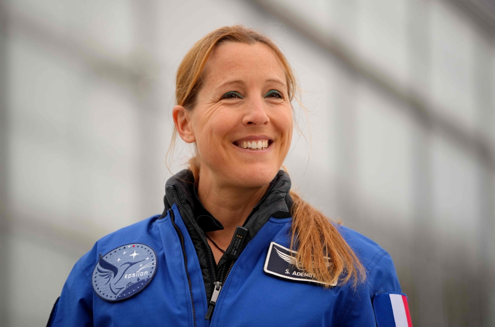 (FILES) French ESA astronaut Sophie Adenot addresses a press conference and plants a tree at the European Space Agency (ESA) in Cologne, western Germany on January 5, 2026.  (Photo by Pau BARRENA / AFP)