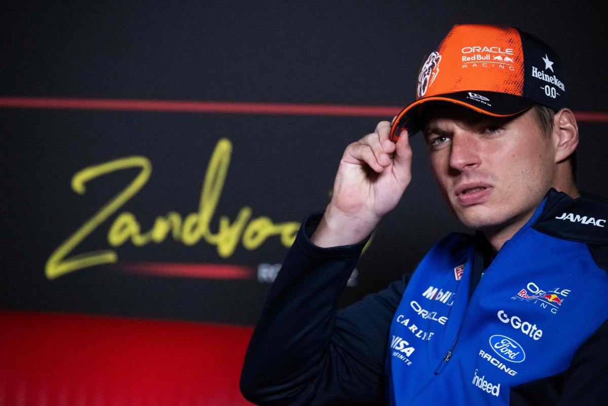 Red Bull Racing's Dutch driver Max Verstappen smiles during a press conference ahead of the Formula One Dutch Grand Prix at The Circuit Zandvoort, western Netherlands, on August 20, 2026. (Photo by JOHN THYS / AFP)