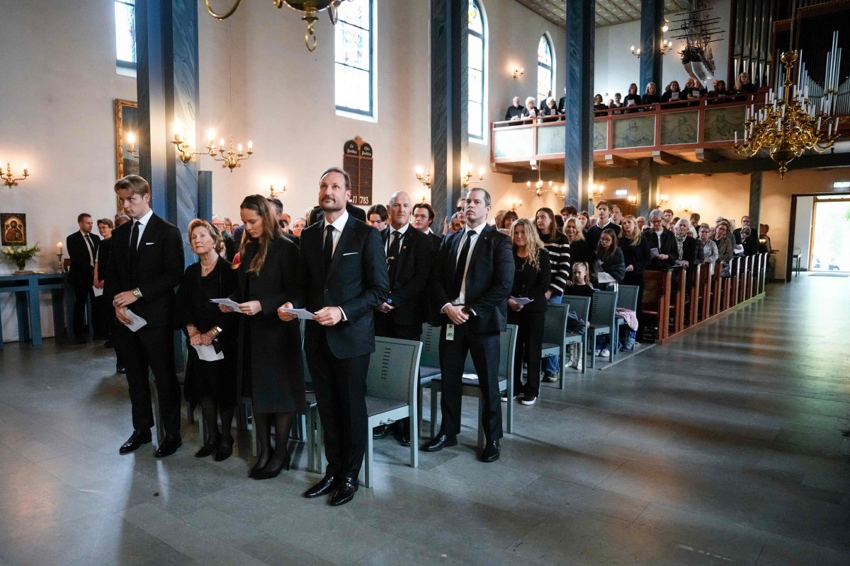Norway's King Haakon VIII (R), Crown Princess Ingrid Alexandra (2ndR), Queen Sonja (2ndL) and Prince Sverre Magnus (L) attend a memorial church service for the late King Harald V at Asker Church in Asker, Norway, on August 30, 2026. Photo by Cornelius Poppe / NTB / AFP