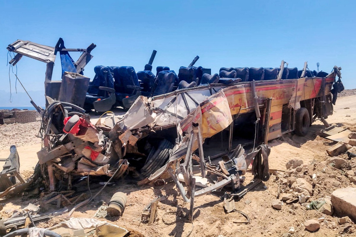 The wreckage of a passenger bus that overturned on the Dahab-Nuweiba road is pictured at the site of the crash in Egypt's South Sinai province on September 2, 2026. (Photo by AFP)