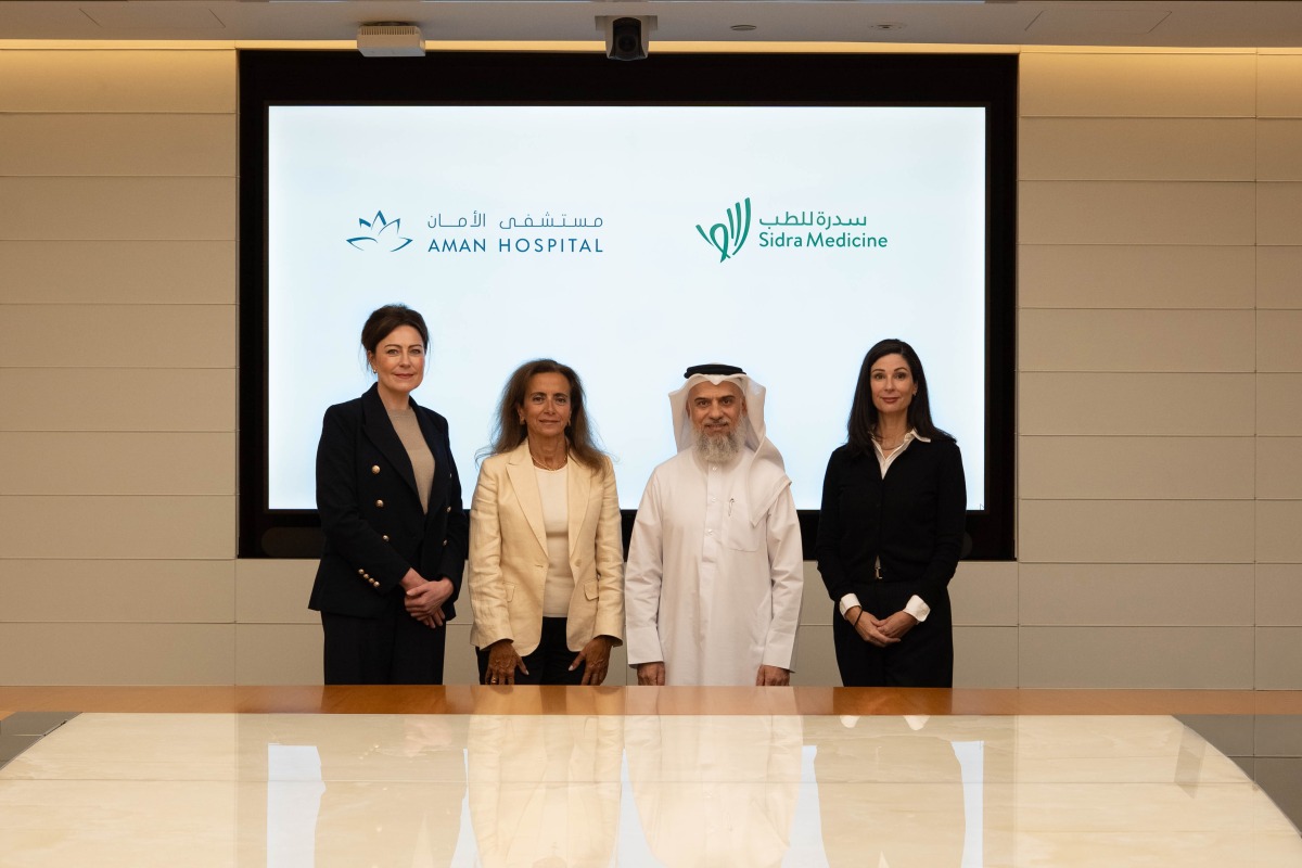 Chief Medical Officer at Sidra Medicine, Prof Ibrahim Janahi (second right) and other officials at the MoU signing ceremony. 