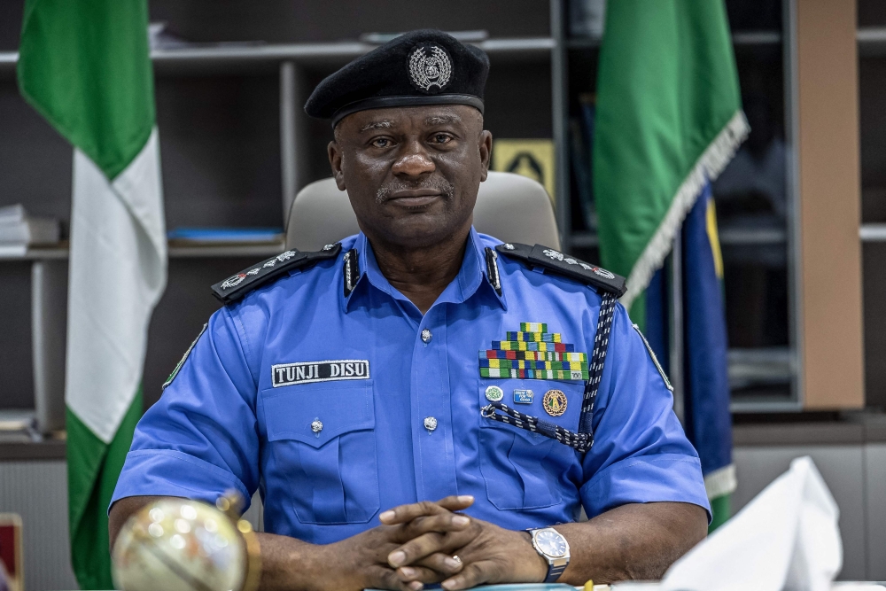 Nigeria's Inspector-General of Police Olatunji Disu poses for a portrait inside his office at the Nigeria Police Force Headquarters, Louis Edet House, in Abuja, on September 9, 2026.  (Photo by Light Oriye Tamunotonye / AFP)