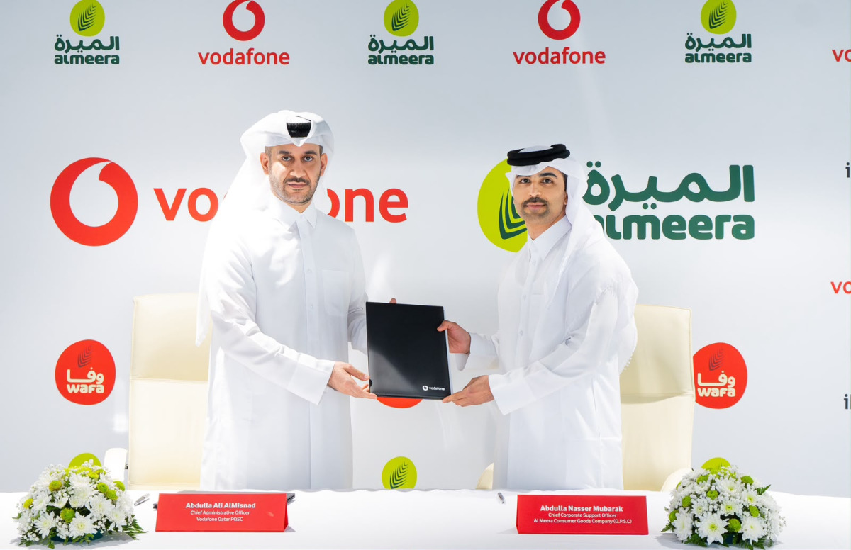 Vodafone Qatar and almeera officials at the signing ceremony.