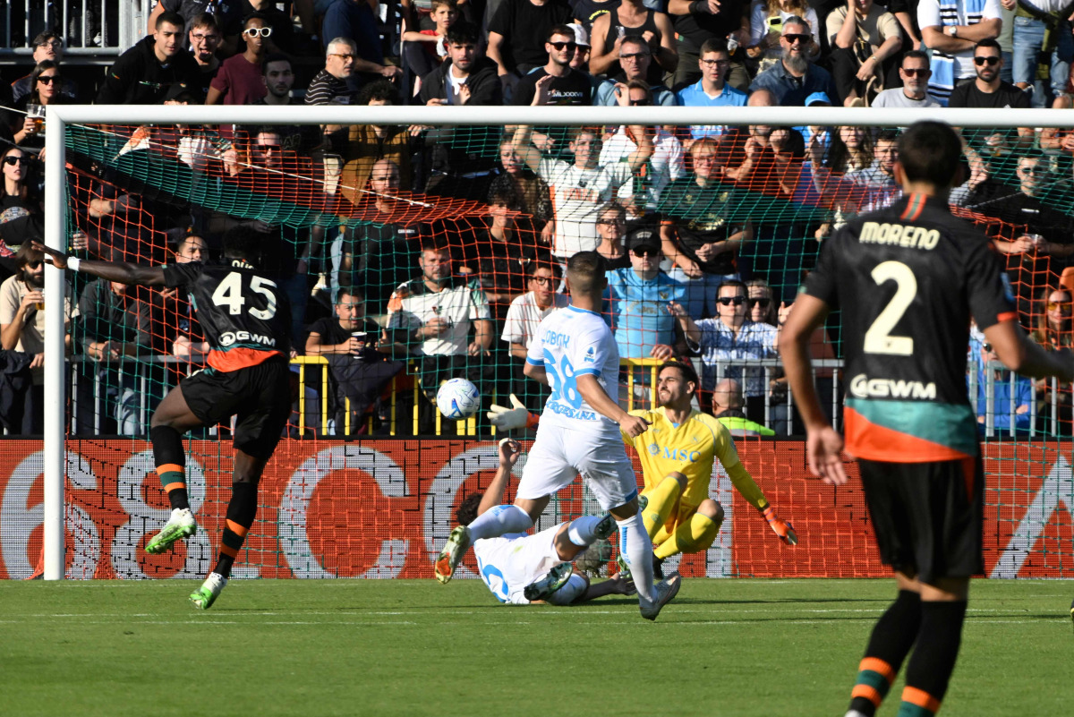 Venezia FC's Nigerian forward #45 Akor Adams (L) scores a goal during the Italian Serie A football match between Venezia and Napoli at the Pier Luigi Penzo Stadium, in Venice northeastern Italy, on October 17, 2027. (Photo by ANDREA PATTARO / AFP)