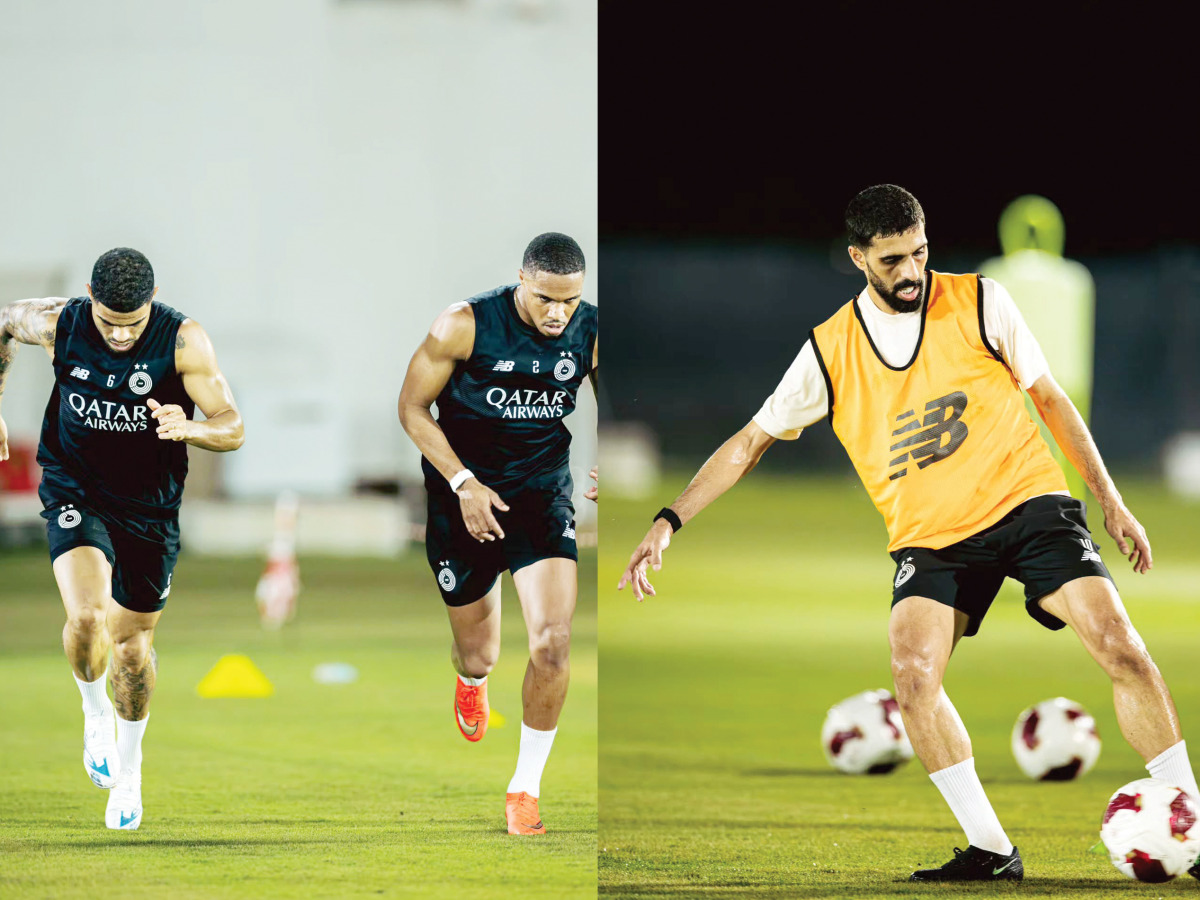 Al Sadd's Paulo Otavio Pedro Miguel and Hassan Al Haydos during a training session. 