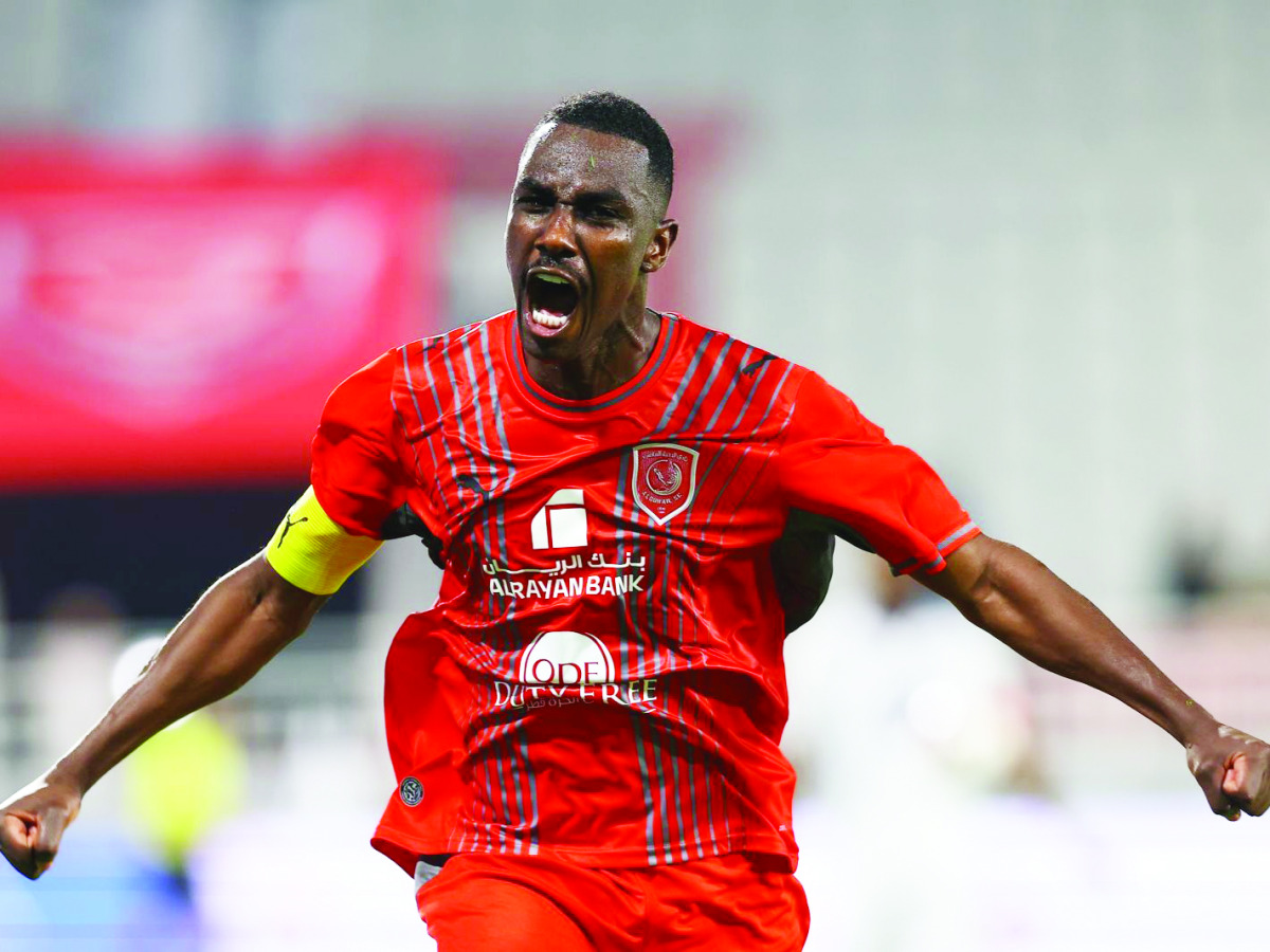 Al Duhail's Almoez Ali celebrates after scoring a goal. 