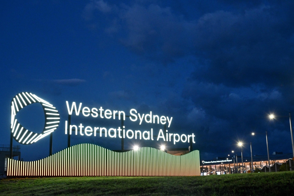 A view of signage at the newly-opened Western Sydney International Airport in Sydney on October 26, 2026. (Photo by Saeed Khan / AFP)